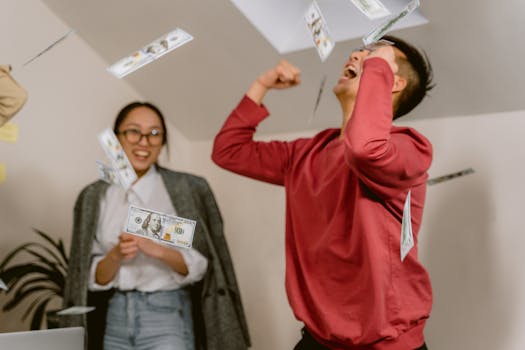 A happy nurse celebrating financial success