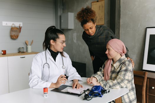 nurse smiling while talking to a patient