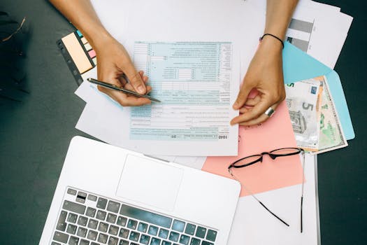 calculator and documents on a desk