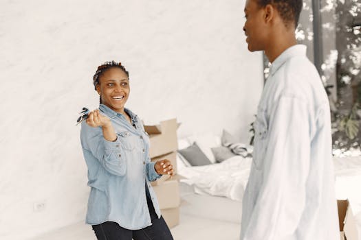 happy couple holding house keys