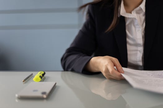 Nurse reviewing financial documents