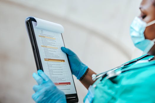 Healthcare worker reviewing finances with a checklist