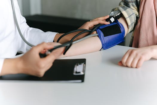 nurse checking patient records